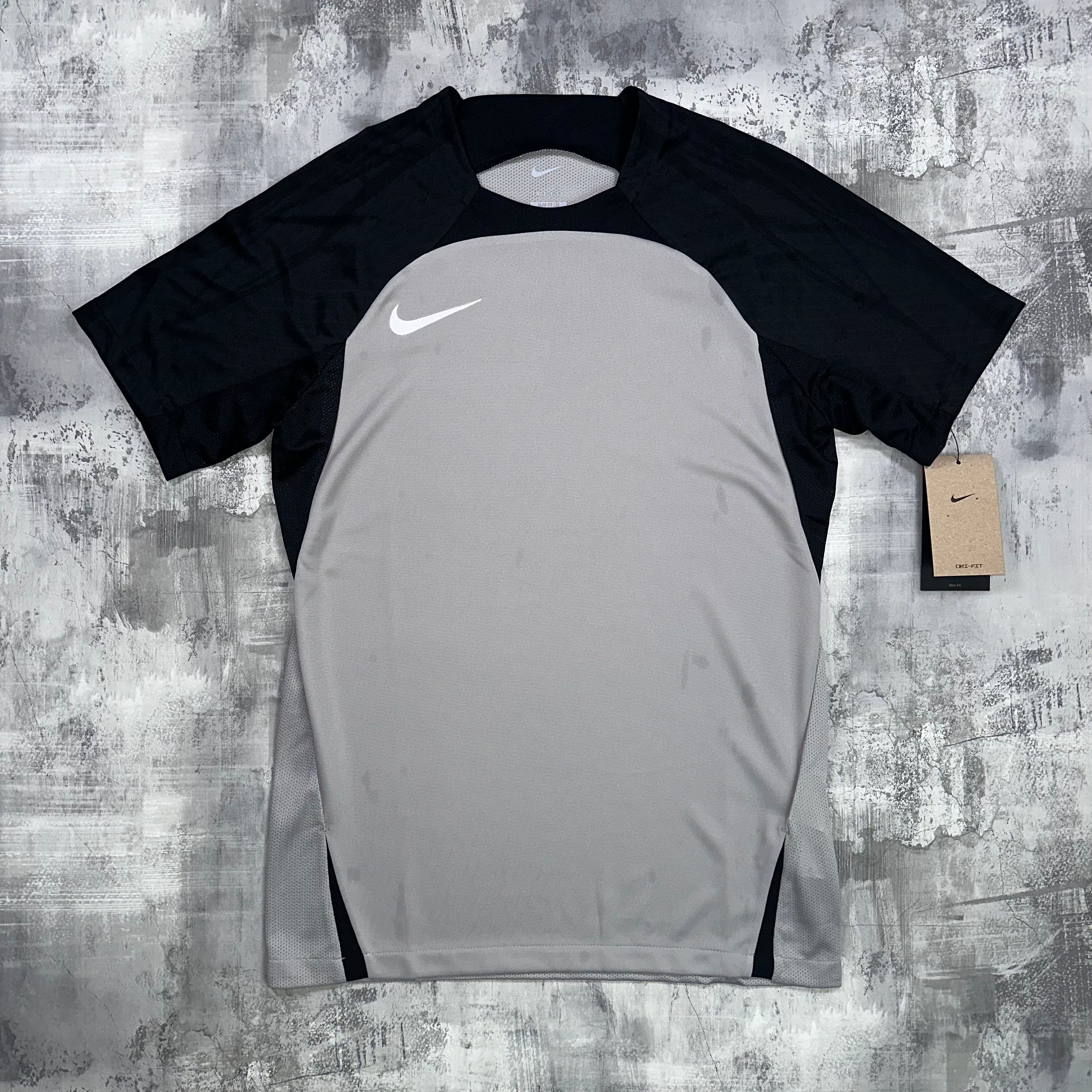 black and silver nike shirt