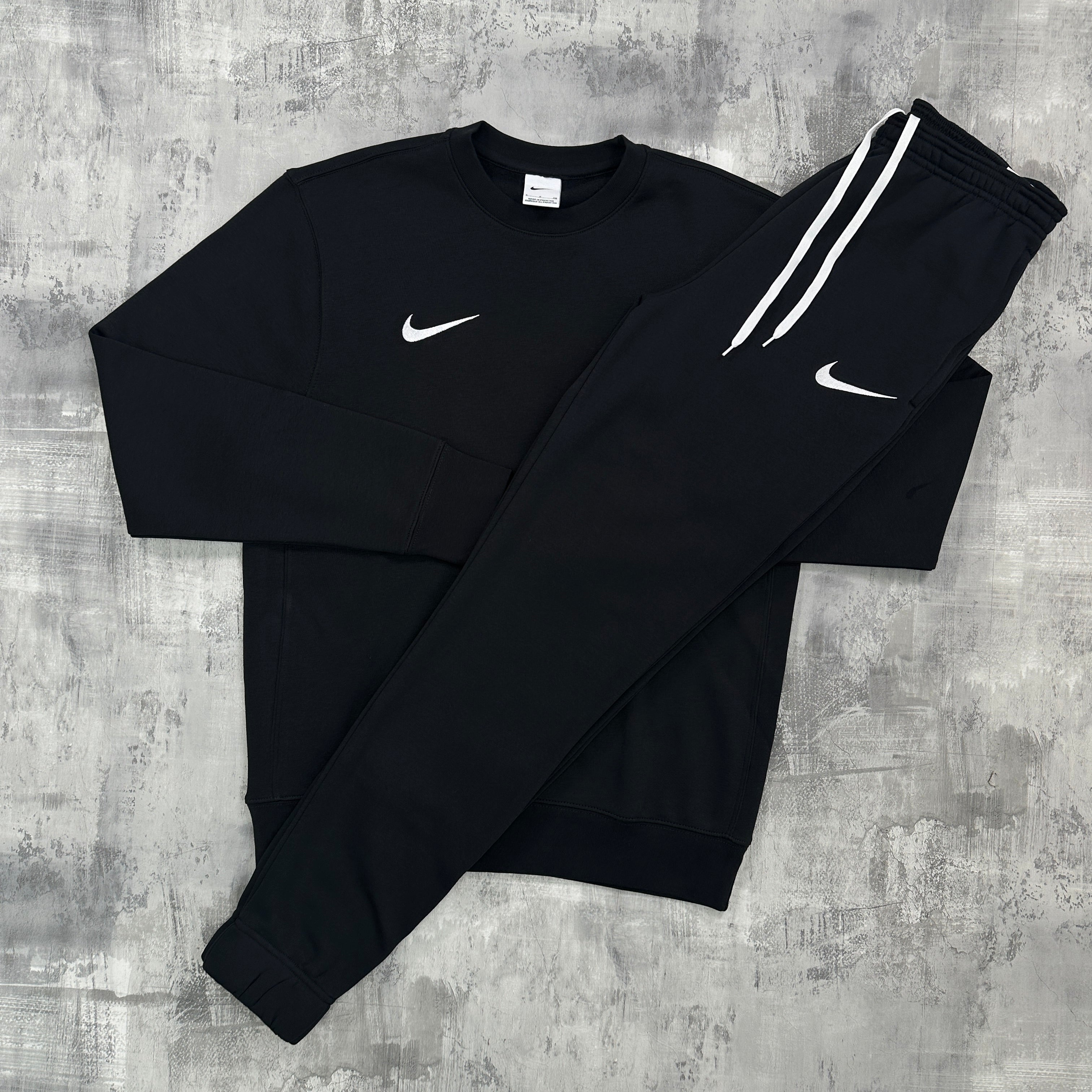 Nike club swoosh tracksuit online